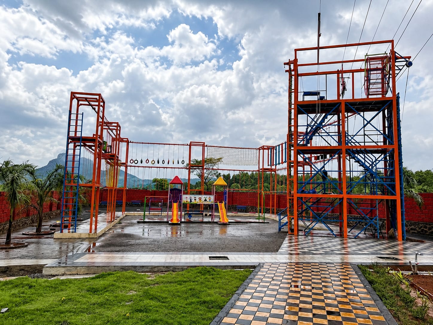 The rope course and climbing tower, with hanging rings and net bridges